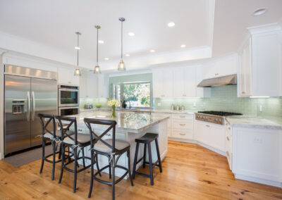 bright white kitchen with recessed ceiling