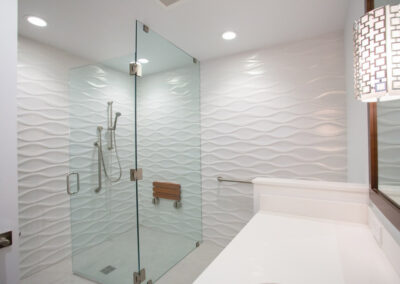 bathroom wall with dimensional geometric pattern in subtle white