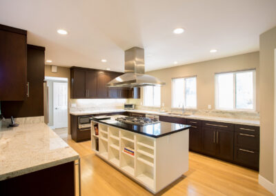 kitchen with three windows letting in lots of natural light