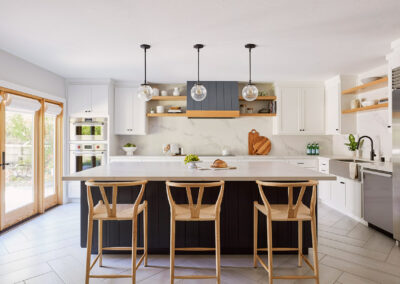 kitchen with white cabinets and natural wood accents