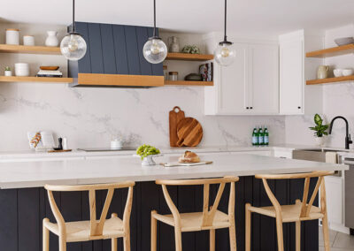 bar stools at kitchen island in warm white kitchen