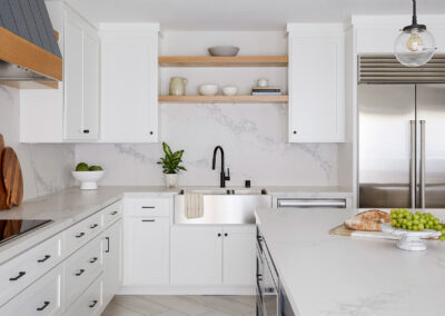 modern white kitchen with open shelving and cabinets