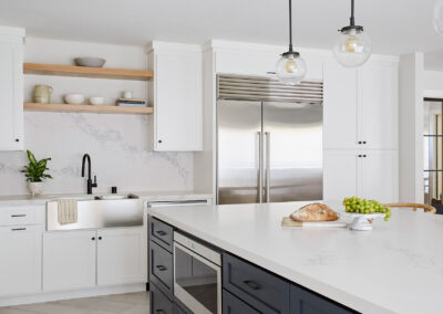 modern kitchen with large island and pendant lighting