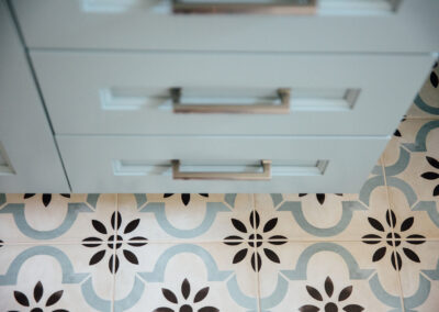 bathroom tile floor detail and vanity drawer detail